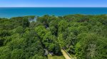 Coastal Cottage is so close to Lake Michigan you can hear it and even catch glimpses of sunsets from the sunroom 